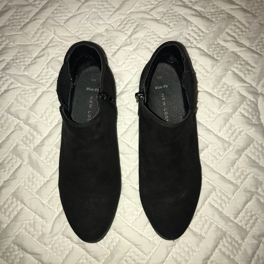 Black booties with zippers